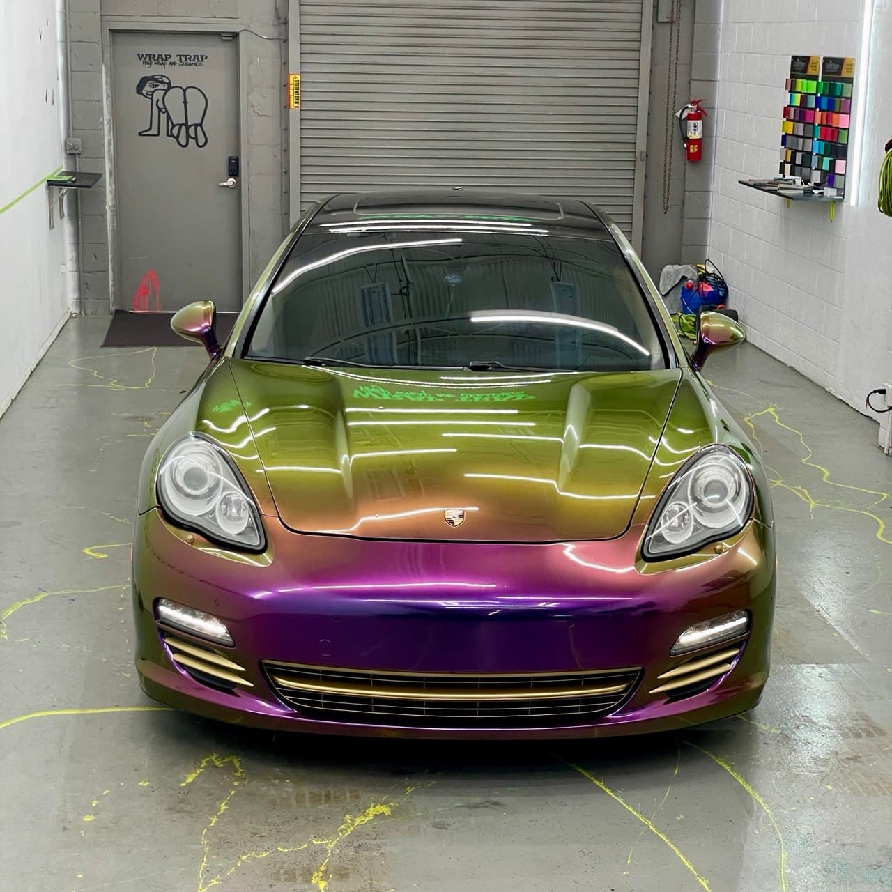 Porsche Panamera wrapped in Crazy Grape color-shift vinyl by Wrap Trap, Hollywood FL.