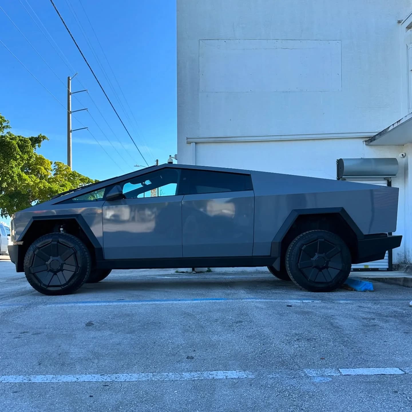Tesla Cybertruck side profile after a full wrap at Wrap Trap in Hollywood, FL